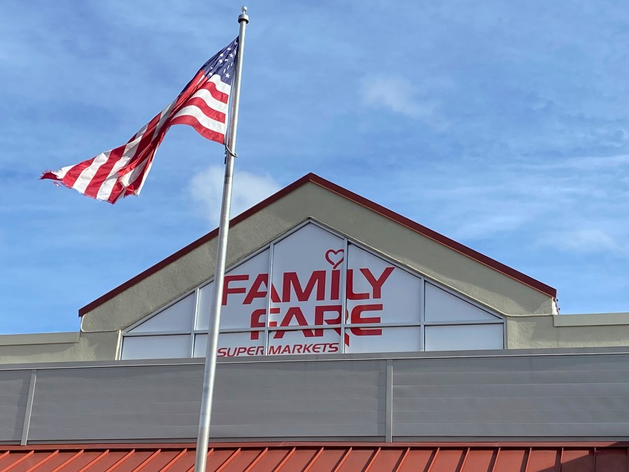 A Family Fare store is shown in Midland, Mich., Thursday, May 9, 2024. Contractors curious about an extension cord on the roof of a Michigan grocery store made a startling discovery: A 34-year-old woman was living inside the business sign, with enough space for a computer, printer and coffee maker, police said. (Heather Jordan/Saginaw News via AP)