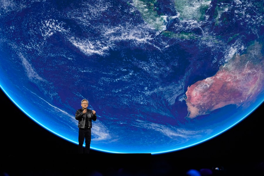 FILE - Nvidia CEO Jensen Huang speaks about AI and climate during the keynote address at Nvidia GTC in San Jose, Calif., March 18, 2024. Nvidia reports earnings on Wednesday, May 22, 2024. (AP Photo/Eric Risberg, File)