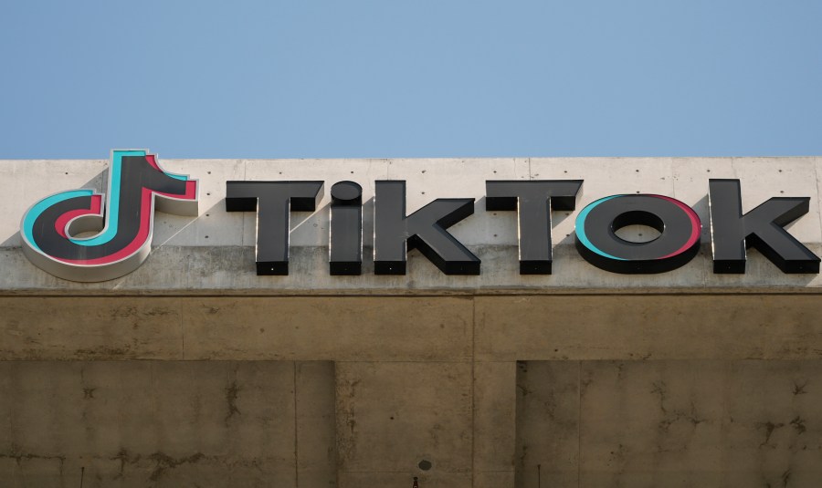 FILE - A TikTok sign is displayed on their building in Culver City, Calif., March 11, 2024. TikTok said Thursday, May 23, its putting in place new rules to limit the reach of state-affiliated media accounts. (AP Photo/Damian Dovarganes, File)