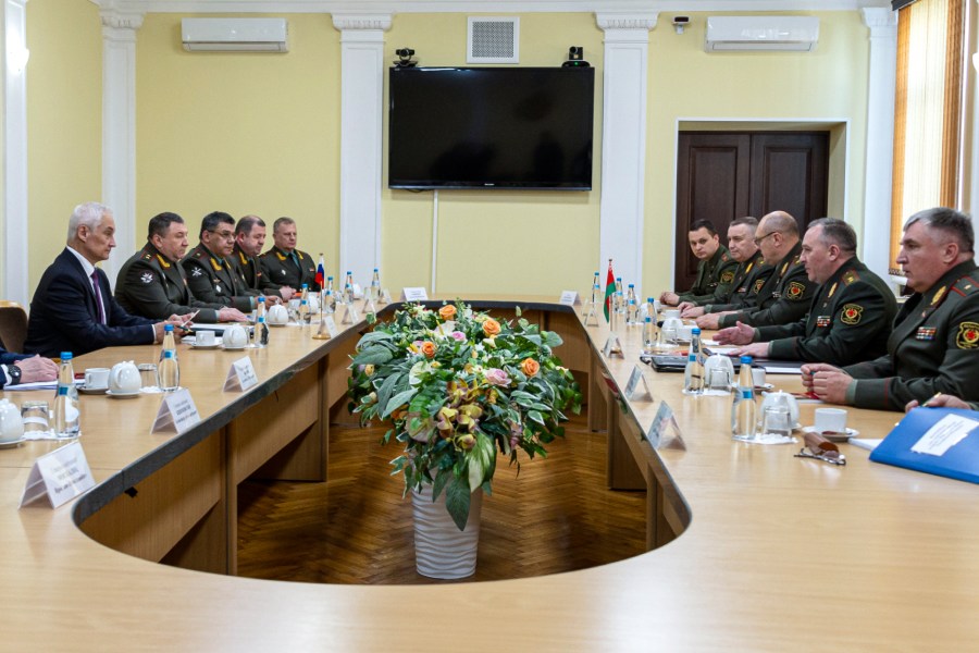 This photo taken from video released by the Russian Defense Ministry Press Service on Friday, May 24, 2024, Russian Defense Minister Andrei Belousov, left, and Belarusian Defense Minister Viktor Khrenin, second right, attend talks in Minsk, Belarus. (Russian Defense Ministry Press Service via AP)