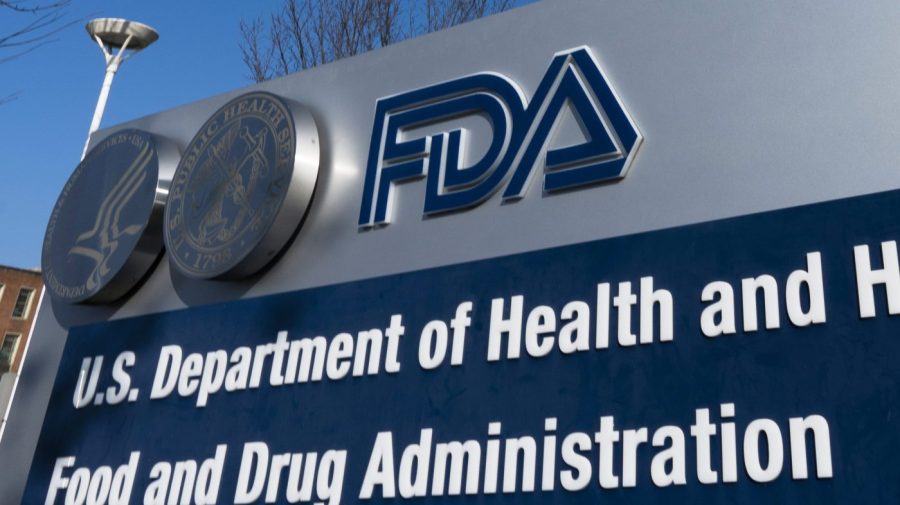 A sign for the Food and Drug Administration is displayed outside.