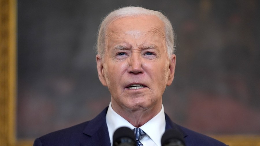 President Biden is seen in a close-up while speaking.