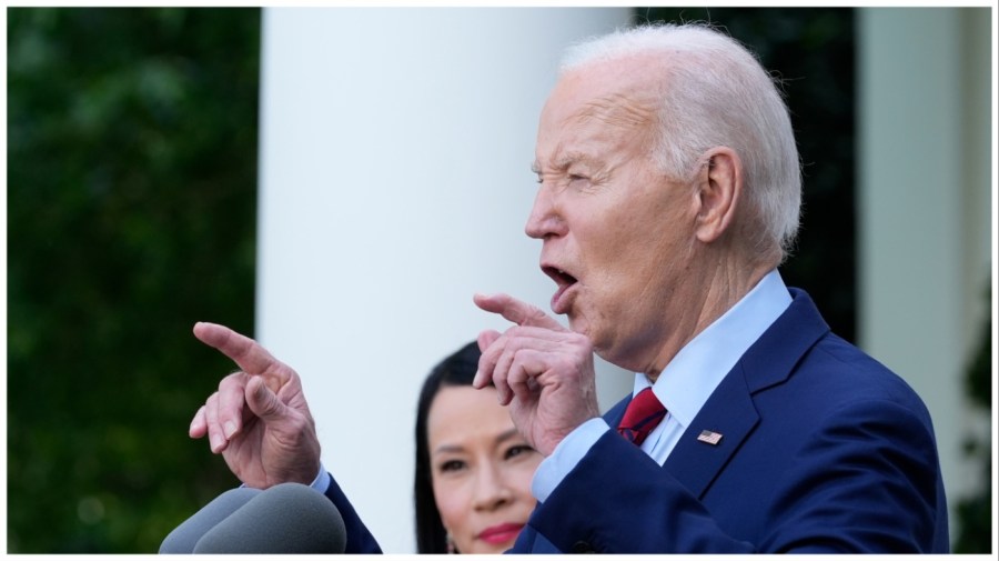 President Joe Biden speaks as actor Lucy Liu listens in the Rose Garden of the White House in Washington, Monday, May 13, 2024, during a reception celebrating Asian American, Native Hawaiian, and Pacific Islander Heritage Month. (AP Photo/Susan Walsh)