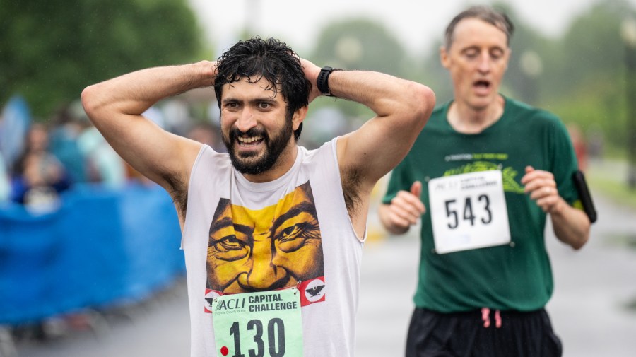 Rep. Greg Casar, D-Texas, crosses the finish line at the ACLI Challenge race in Washington on Wednesday, May 15, 2024.