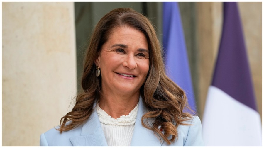 Philanthropist Melinda French Gates poses for photographers at an event.