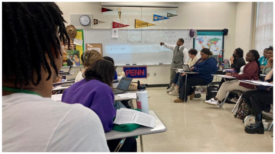 An instructor teaches a group of students.