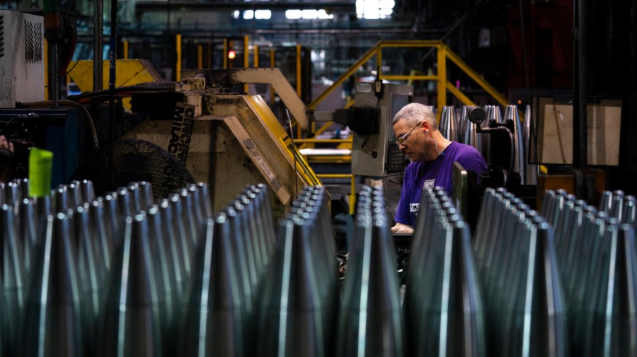 A steel worker manufactures 155 mm M795 artillery projectiles at the Scranton Army Ammunition Plant in Scranton, Pa., Thursday, April 13, 2023.