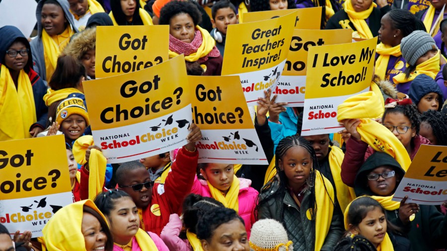 Several hundred students, parents, teachers and elected officials, participate in a school choice rally, part of the National School Choice Week, on the steps of the Capitol in Jackson, Miss., Tuesday, Jan. 22, 2019.