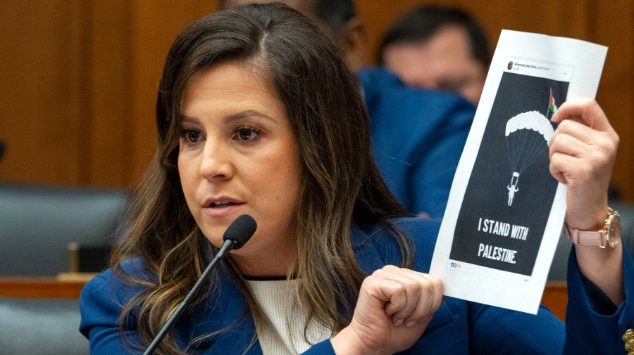 Rep. Elise Stefanik, R-N.Y., hołds up a printout that she claims was from a New York City public school teacher's social media account, during a Subcommittee on Early Childhood, Elementary, and Secondary Education hearing on antisemitism in K-12 public schools, Wednesday, May 8, 2024, on Capitol Hill in Washington.