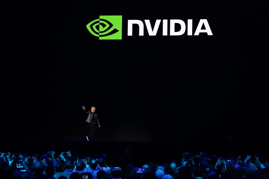 FILE - CEO Jensen Huang walks on stage before the keynote address of Nvidia GTC in San Jose, Calif., Monday, March 18, 2024. Nvidia’s stock price has jumped 92% this year as of Wednesday, May 22, increasing the company’s market value by more than $1 trillion. Those numbers are headed higher again Thursday after the company reported better-than-expected quarterly results. (AP Photo/Eric Risberg)