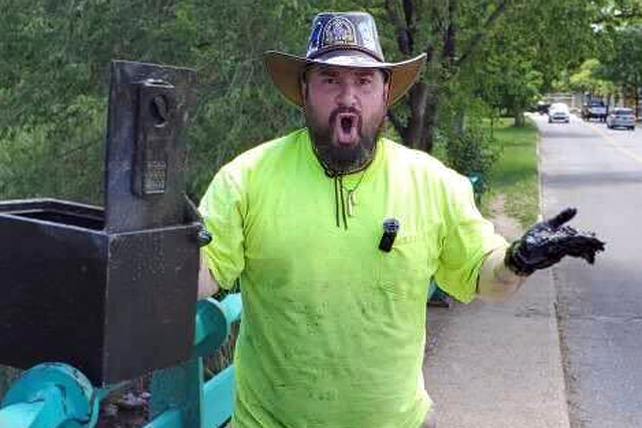 In this still image from video, Magnet fisher James Kane exclaims as he reacts to the contents of a safe he pulled out of a pond, in Flushing Meadows Corona Park, in the Queens borough of New York, Friday May 31, 2024. Kane, 40. and his girlfriend, Barbi Agostini, 39, estimate the safe contained $100,000 in waterlogged, damaged but exchangeable currency. (James Kane and BarbI Agostini @LetsGetMagnetic via AP)