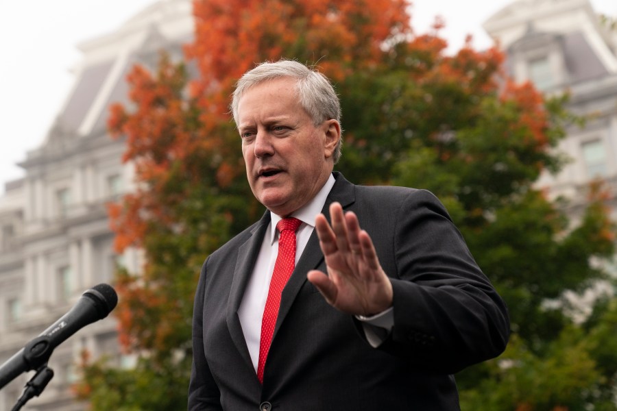 FILE - White House former chief of staff Mark Meadows speaks with reporters at the White House, Wednesday, Oct. 21, 2020, in Washington. Meadows appeared by videoconference, Friday, June 7, 2024, in Phoenix, pleading not guilty to nine felony charges stemming from their roles in an effort to overturn Trump's election loss in Arizona to Joe Biden. (AP Photo/Alex Brandon, File)