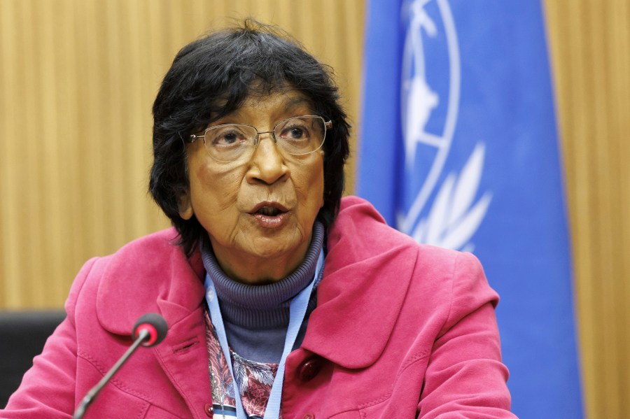 FILE - Former U.N. High Commissioner for Human Rights Navi Pillay, Chair commissioner of the Independent International Commission of Inquiry on the Occupied Palestinian Territory, including East Jerusalem, and Israel, delivers her remarks, during a meeting at the European headquarters of the United Nations in Geneva, Switzerland, Monday, March 20, 2023. U.N.-backed human rights experts say in a report issued Wednesday, June 12, 2024, that Israeli forces and Palestinian militants engaged in sexual and gender-based violence during the first months of the Israel-Hamas war. The report, which covered the time between the Oct. 7, 2023 rampage and the end of last year, laid out a wide array of alleged rights violations and crimes by both sides during the conflict. (Salvatore Di Nolfi/Keystone via AP, File)