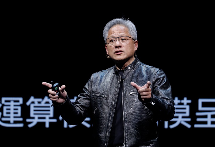 FILE - Nvidia CEO Jensen Huang speaks at the Computex 2024 exhibition in Taipei, Taiwan, June 2, 2024. Nvidia passed Microsoft on Tuesday, June 18, 2024, to become the most valuable company in the S&P 500. (AP Photo/Chiang Ying-ying, File)