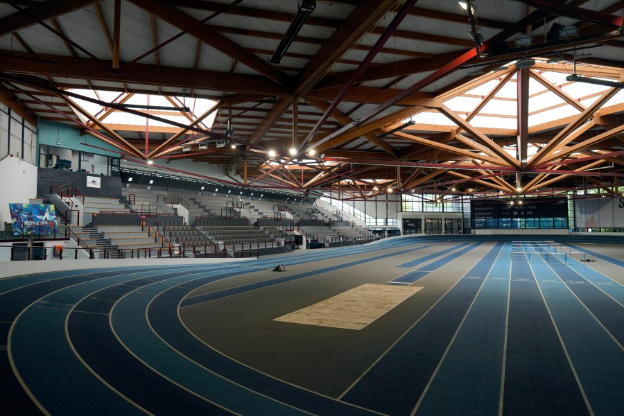 Sunlight streams through a skylight at the Stephane Diagana stadium in the base camp for the U.S athletes at the Paris 2024 Olympic Games, Thursday, June 13, 2024, in Eaubonne, a suburb north of Paris. (AP Photo/Thibault Camus)