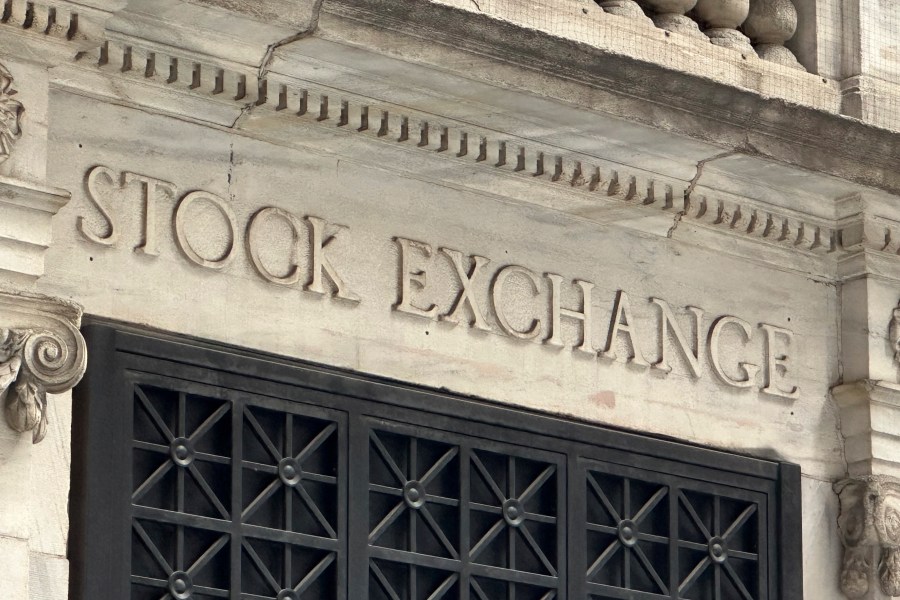 FILE - A sign at the New York Stock Exchange is shown on June 18, 2024 in New York. Global shares are mostly lower on Friday, June 21, 2024, after a retreat on Wall Street, where a drop in Nvidia stock pulled stocks lower. (AP Photo/Peter Morgan, File)