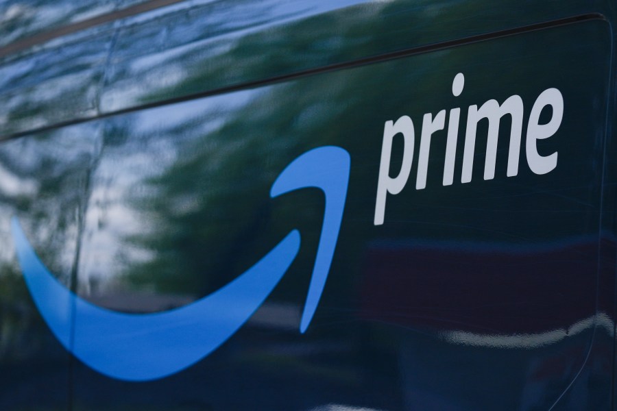 FILE - An Amazon Prime truck is seen on April 5, 2024, in Portland, Ore. Amazon hits a stock market valuation of $2 trillion for the first time on Wednesday, June 26, 2024.(AP Photo/Jenny Kane, File)