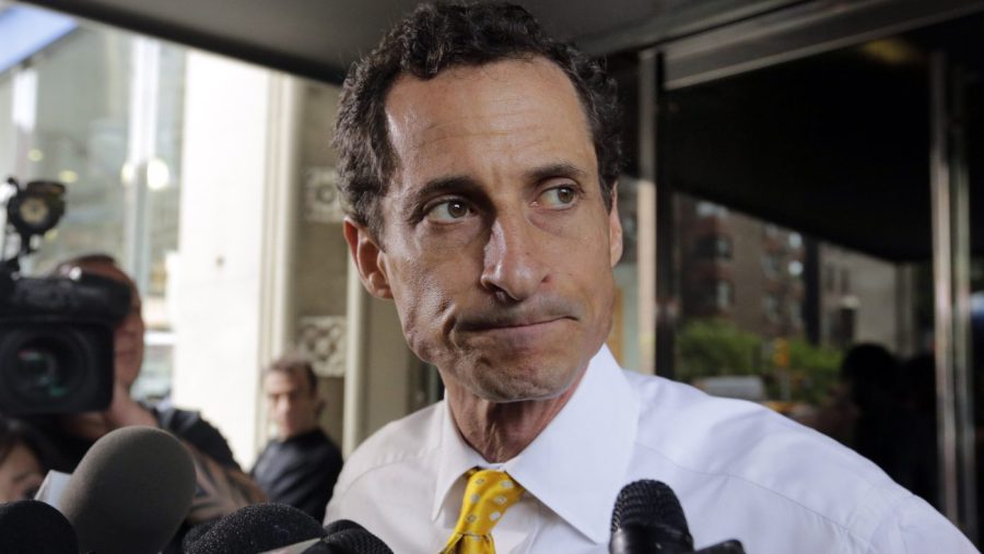 Anthony Weiner looks to the side during a press interview.