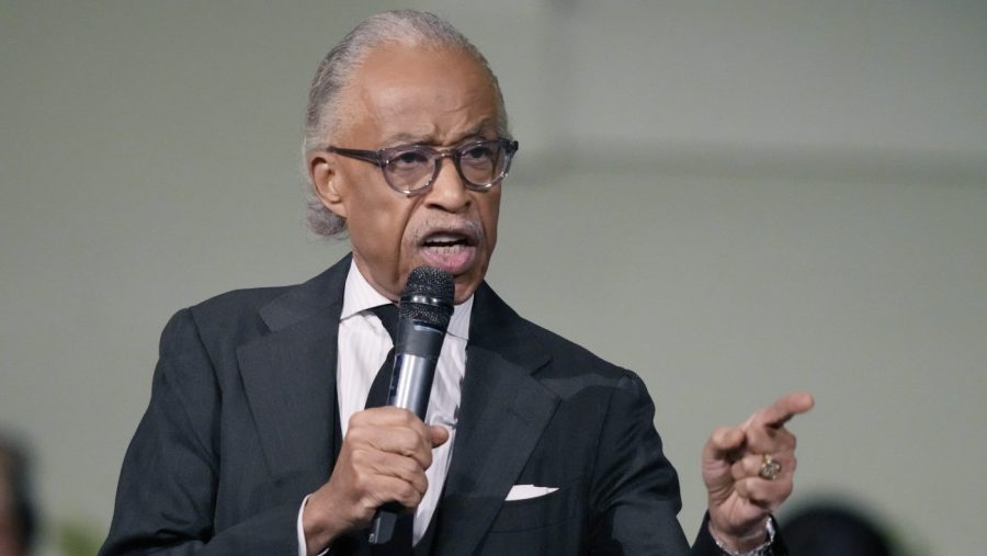 he Rev. Al Sharpton delivers a eulogy at a funeral service.