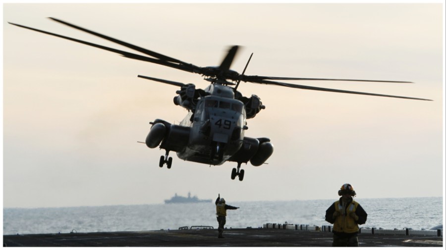 In this Feb. 3, 2012 photo, A MH53 Sea Stallion lands aboard the Amphibious Assault Ship USS Wasp in support of Operation Bold Alligator off the coast of Jacksonville, N.C.