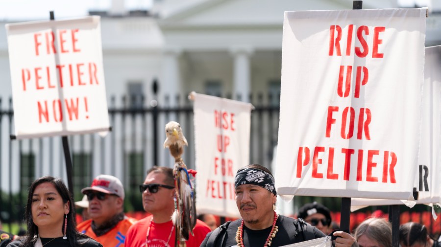 People gather for a rally outside of the White House in support of imprisoned Native American activist Leonard Peltier, Tuesday, Sept. 12, 2023, in Washington.