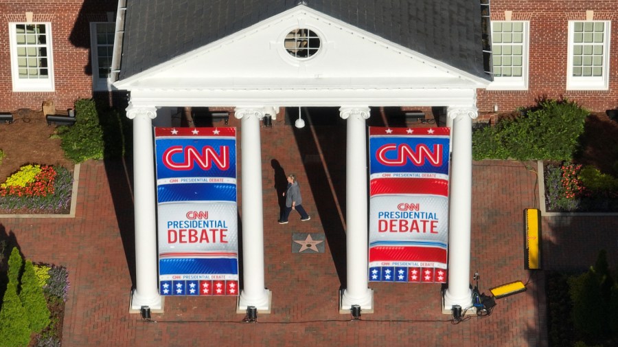 In an aerial view, signage for a CNN presidential debate is seen outside of their studios inside the Turner Entertainment Networks on June 26, 2024 in Atlanta, Georgia. U.S. President Joe Biden and Republican presidential candidate, former U.S. President Donald Trump will face off in the first presidential debate of the 2024 presidential cycle this Thursday. (Photo by Kevin Dietsch/Getty Images)