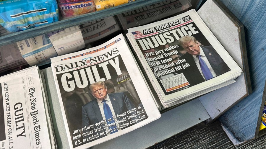 Newspapers are on display at a bodega in the Brooklyn borough of New York a day after a New York jury found former President Donald Trump guilty of 34 felony charges, on Friday, May 31, 2024. (AP Photo/Ruth Brown)