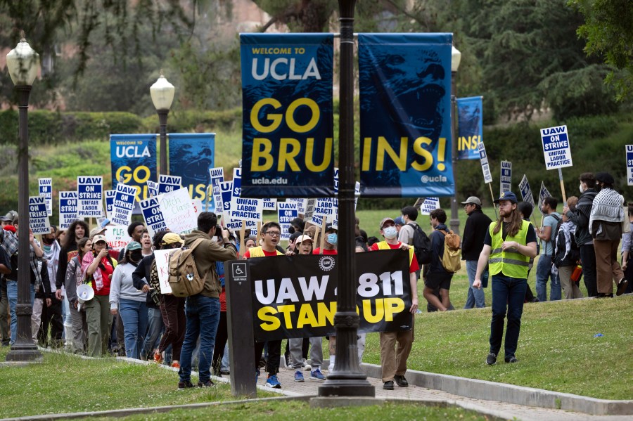 Unionized academic workers at University of California Los Angeles stage a rally on the school's campus on Tuesday, May 28, 2024 in Los Angeles. The workers are upset about the University of California's response to pro-Palestinian protests on campuses and are holding walkouts in response.