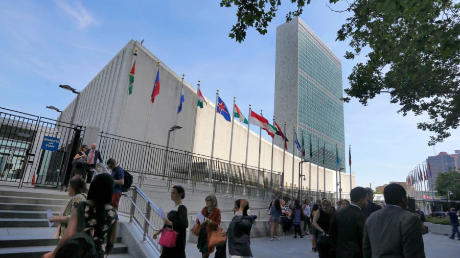 In this June 2, 2016 photo, people gather outside the United Nations visitors entrance.