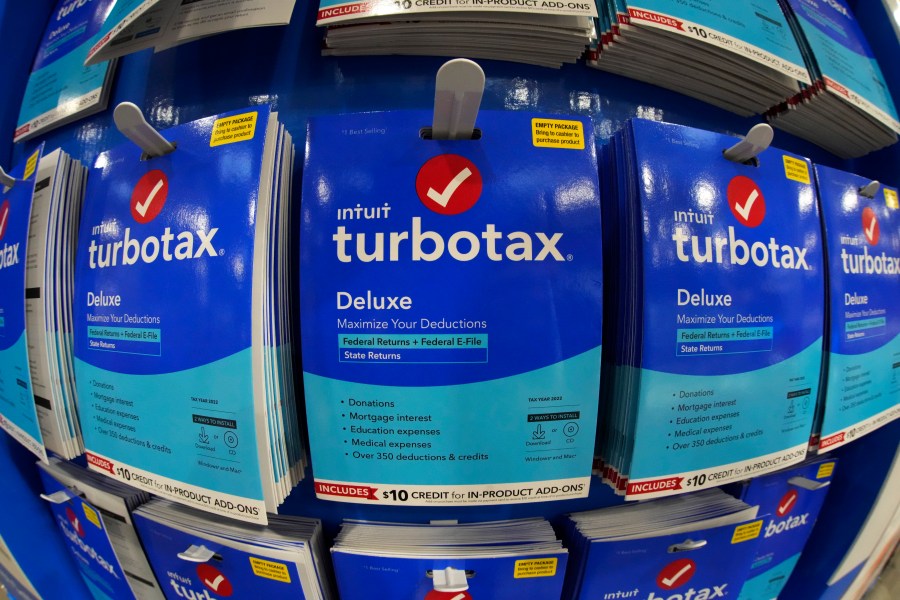 FILE - Intuit TurboTax packages are seen on display in a Costco Warehouse, Jan. 26, 2023, in Pittsburgh. Tax preparation and financial software company Intuit announced an AI-focused reorganization plan Wednesday, July 10, 2024, that includes laying off about 10% of its workforce. (AP Photo/Gene J. Puskar, File)