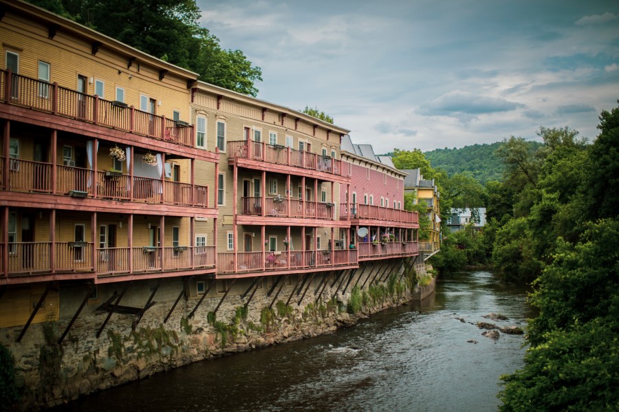 The Winooski River runs through Montpelier, Vt. in this July 3, 2024 photo. The river has flooded the state's capital in 2023 causing massive damages. A year after catastrophic flooding inundated parts of Vermont, some homeowners are still in the throes of recovery. (AP Photo/ Dmitry Belyakov)