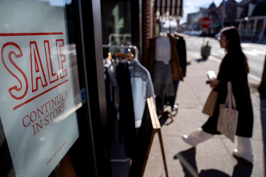 FILE - A shop holds a sidewalk sale on Feb. 10, 2023, in Providence, R.I. Small business sales growth slowed in June, 2024, as consumers took a pause on spending. (AP Photo/David Goldman, File)