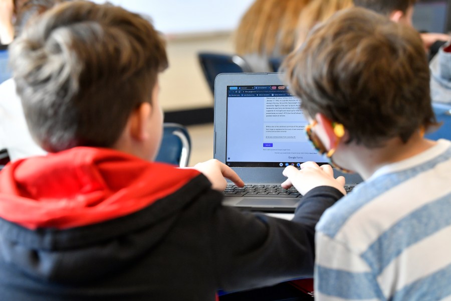 FILE - Students work on a laptop computer at Stonewall Elementary in Lexington, Ky., Feb. 6, 2023. A bill aiming to protect kids from the harms of social media, gaming sites and other online platforms appears to have enough bipartisan support to pass, though whether it actually will remains uncertain. (AP Photo/Timothy D. Easley, File)