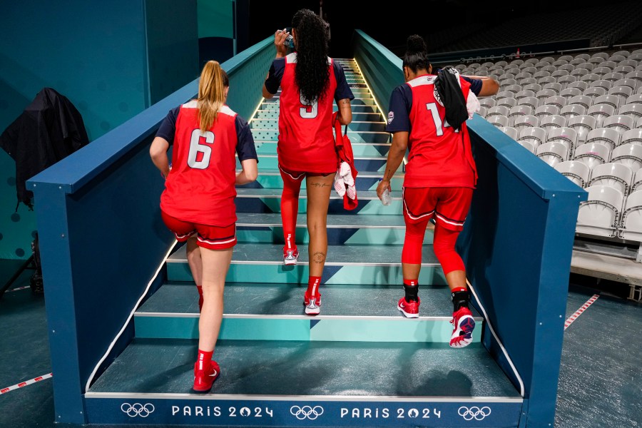 Sabrina Ionescu (6), A'ja Wilson (9) and Alyssa Thomas, leave the court after the United States women's team practiced before the start of the 2024 Summer Olympics, Thursday, July 25, 2024 in Villeneuve-d'Ascq, France. (AP Photo/Michael Conroy)