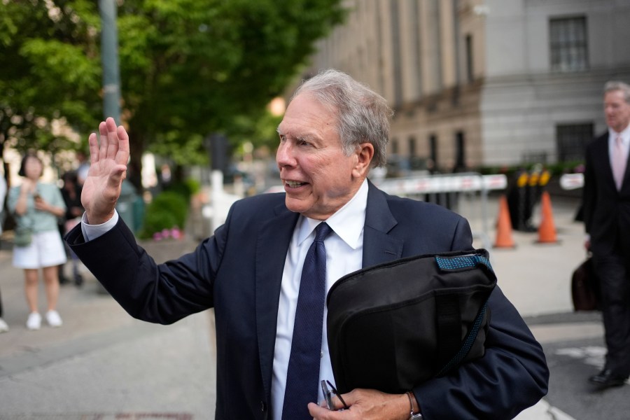 Wayne LaPierre, former CEO of the National Rifle Association, waves to someone as he leaves a courthouse in New York, Monday, July 29, 2024. A New York judge declined to appoint an outside monitor to oversee the finances and internal policies of the National Rifle Association. But he said he would bar LaPierre, the group's former leader, from holding a paid position in the organization for a decade. (AP Photo/Seth Wenig)