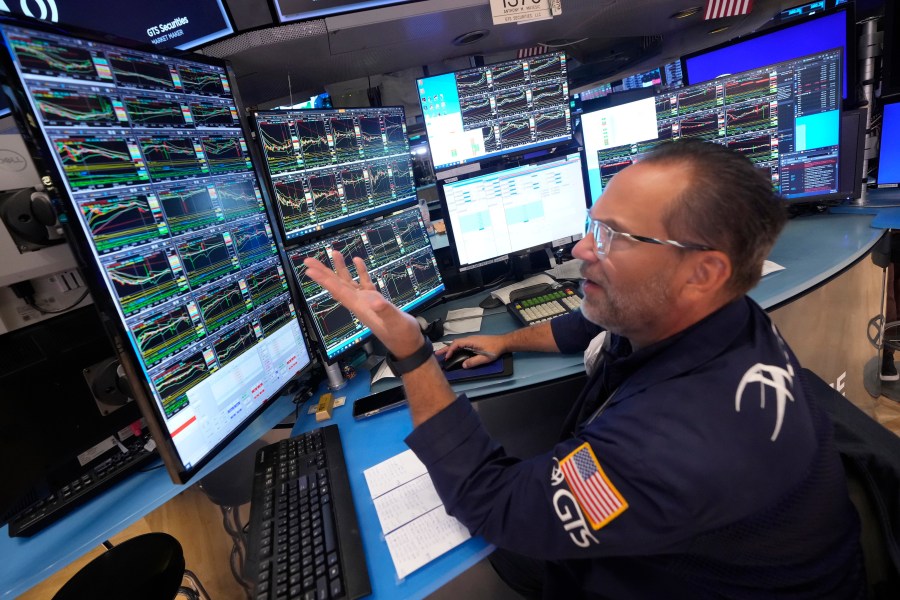 FILE - Specialist Anthony Matesic works on the floor of the New York Stock Exchange, on July 22, 2024. World stocks started of with gains July 29, 2024 ahead of central bank policy meetings in the United States and Japan, after a broad rally on Wall Street that capped a tumultuous week. (AP Photo/Richard Drew, File)