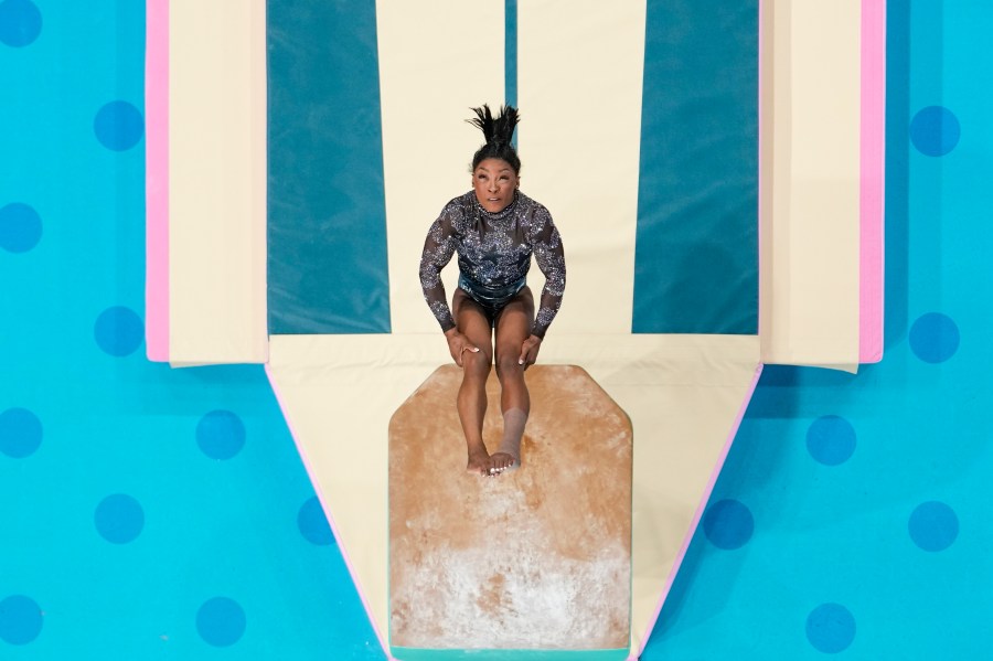 Simone Biles, of United States, performs on the vault during a women's artistic gymnastics qualification round at the 2024 Summer Olympics, Sunday, July 28, 2024, in Paris, France. (AP Photo/Morry Gash)