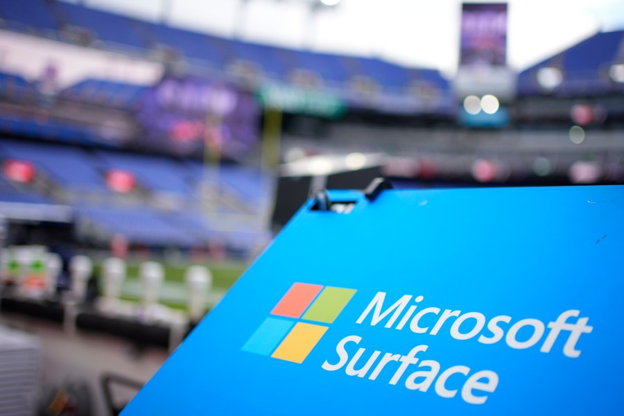 File - A Microsoft Surface logo is seen before an NFL football game between the Houston Texans and the Baltimore Ravens, on Jan. 20, 2024, in Baltimore. Microsoft reports earnings on Tuesday, July 30, 2024. (AP Photo/Matt Slocum, File)