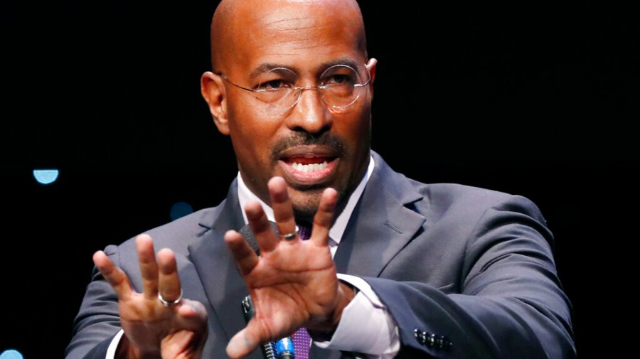 Van Jones gestures while speaking at an event.