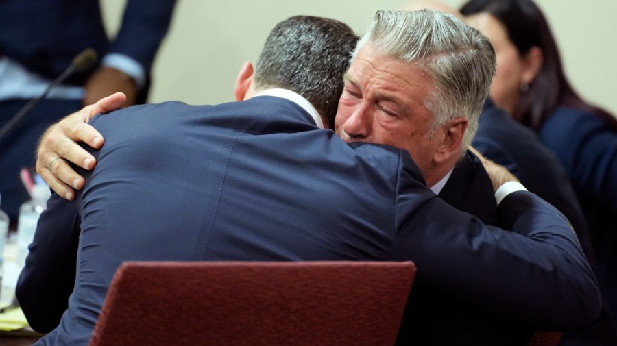 Alec Baldwin hugs his attorney Alex Spiro at the conclusion of his trial for involuntary manslaughter in First Judicial District Court on July 12, 2024 in Santa Fe, New Mexico. The trial for involuntary manslaughter was dismissed by a judge Friday after she ruled that key evidence over a fatal shooting on the set of "Rust" had been withheld from the defense. (Photo by Ramsay de Give-Pool/Getty Images)