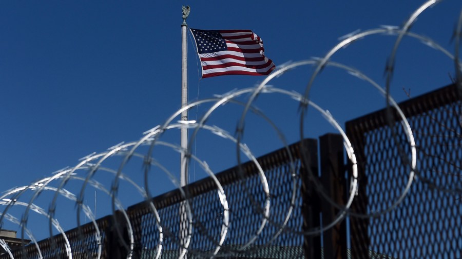 Barbed wire fencing surrounds the US Supreme Court on March 5, 2021 in Washington, DC. - Armed US National Guard troops patrolled the US Capitol on March 4 after officials warned of a new attack plot by extremists, but the feared show of force by those still angry over Donald Trump's election defeat did not materialize. But security officials also said that the threat is ongoing and could continue through 2022. (Photo by OLIVIER DOULIERY / AFP) (Photo by OLIVIER DOULIERY/AFP via Getty Images)