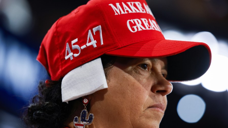 Arizona delegate Stacy Goodman wears a 'bandage' on her ear on the third day of the Republican National Convention at the Fiserv Forum on July 17, 2024 in Milwaukee, Wisconsin. Delegates, politicians, and the Republican faithful are in Milwaukee for the annual convention, concluding with former President Donald Trump accepting his party's presidential nomination. The RNC takes place from July 15-18. (Photo by Joe Raedle/Getty Images)