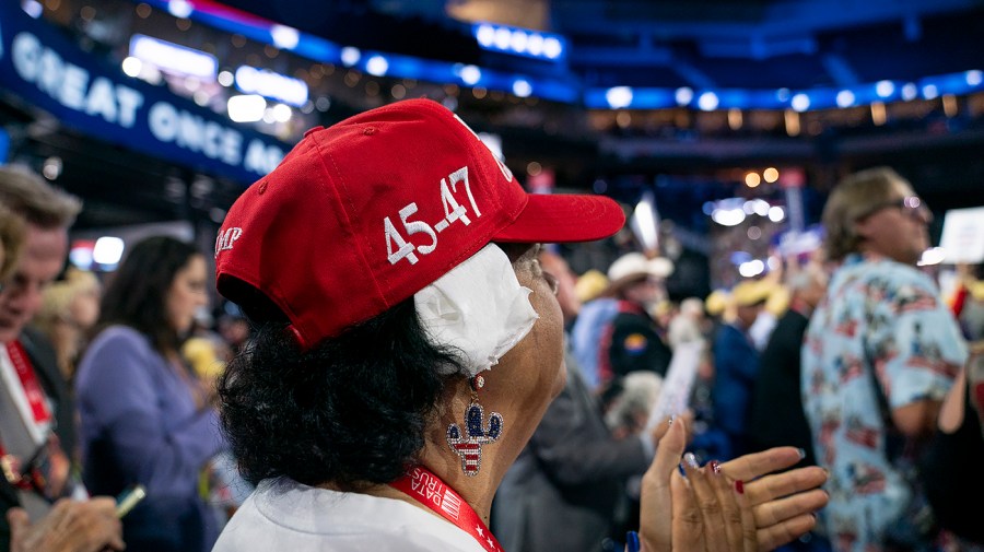 Delegates from Arizona wear bandages similar to former President Trump's during the Republican National Convention