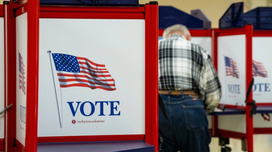 A voter casts their ballot at a polling station at the VFD Activities Building in Middletown, Maryland, US, on Tuesday, May 7, 2024. Early voting is underway ahead of Maryland's May 14 primary election, which will determine which Democratic US Senate candidate will take on Republican ex-Governor Larry Hogan, as well as who moves on to the general election in the competitive House race to succeed Democratic Representative David Trone in Maryland's sixth congressional district. Photographer: Graeme Sloan/Bloomberg via Getty Images