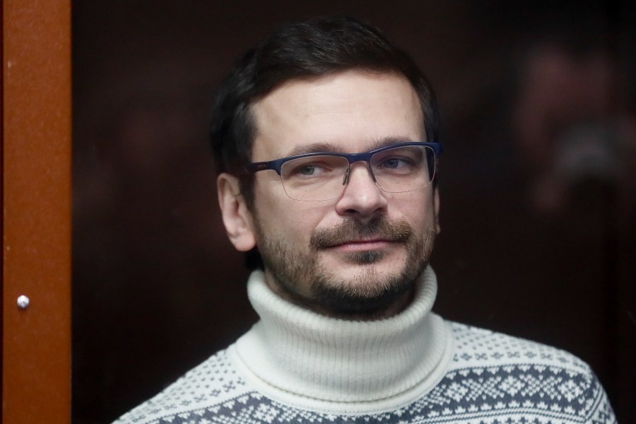 FILE - Russian opposition activist and former municipal deputy of the Krasnoselsky district Ilya Yashin stands inside a glass cubicle in a courtroom prior to a hearing in Moscow, Russia, Friday, Dec. 9, 2022. (Yury Kochetkov/Pool Photo via AP, File)