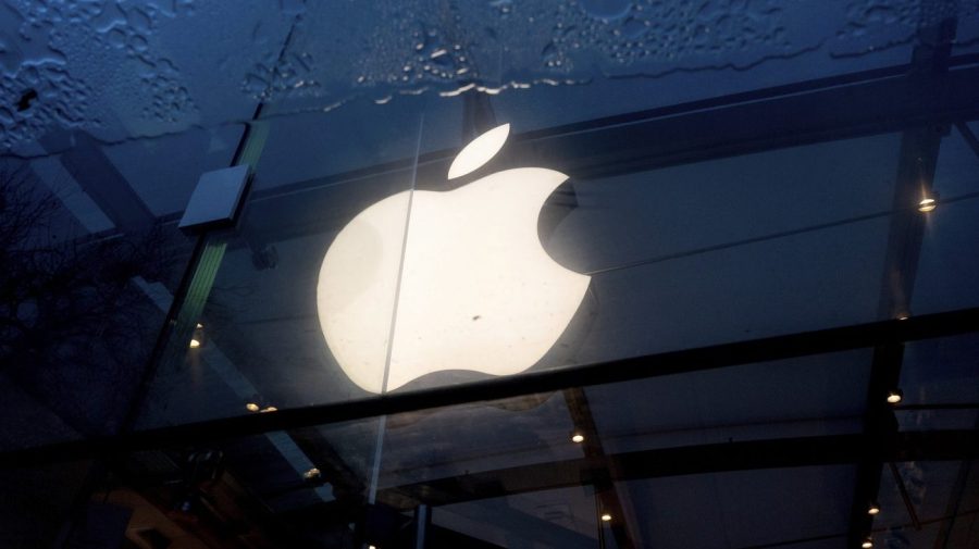 An Apple logo hangs at a Palo Alto, Calif., Apple store on Friday, Feb. 2, 2024. (AP Photo/Noah Berger)