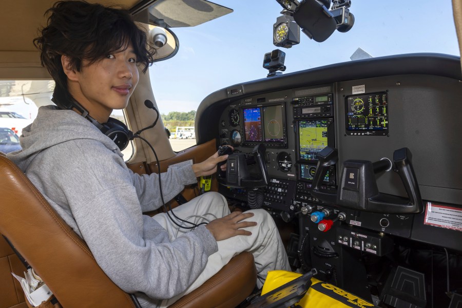 American pilot Ethan Guo poses for the photographer in Geneva, Switzerland, Tuesday, August 6, 2024 before his take off from Geneva Airport for attempting world record solo flight all seven Continents. (Salvatore Di Nolfi/Keystone via AP)