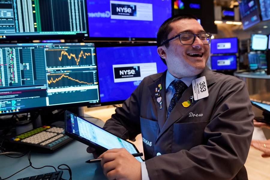 Trader Drew Cohen works on the floor of the New York Stock Exchange, Tuesday, Aug. 6, 2024.(AP Photo/Richard Drew)