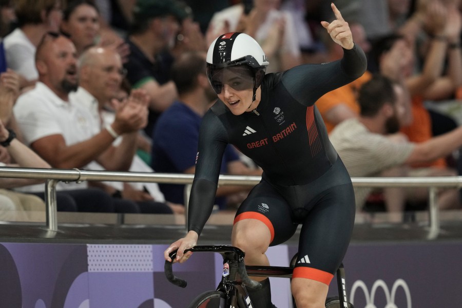 Katy Marchant of Team Britain celebrates winning the gold medal in the women's team sprint event, at the 2024 Summer Olympics, Monday, Aug. 5, 2024, in Paris, France.