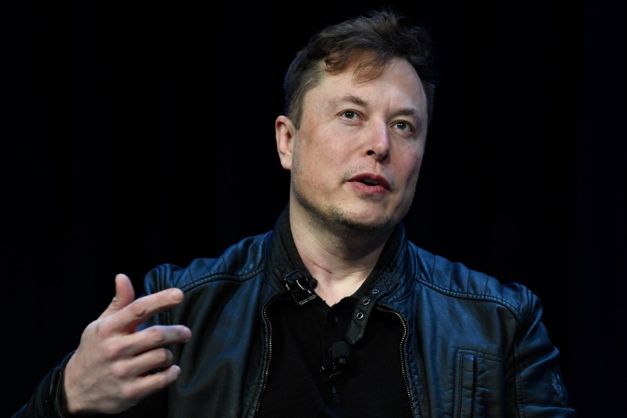 FILE - Tesla and SpaceX CEO Elon Musk speaks at the SATELLITE Conference and Exhibition in Washington, March 9, 2020. The British government on Tuesday, Aug. 6, 2024, has called on Musk to act responsibly after one of the world’s richest men used his social media platform to unleash a barrage of posts that risked inflaming the violent unrest gripping the country. (AP Photo/Susan Walsh, File)